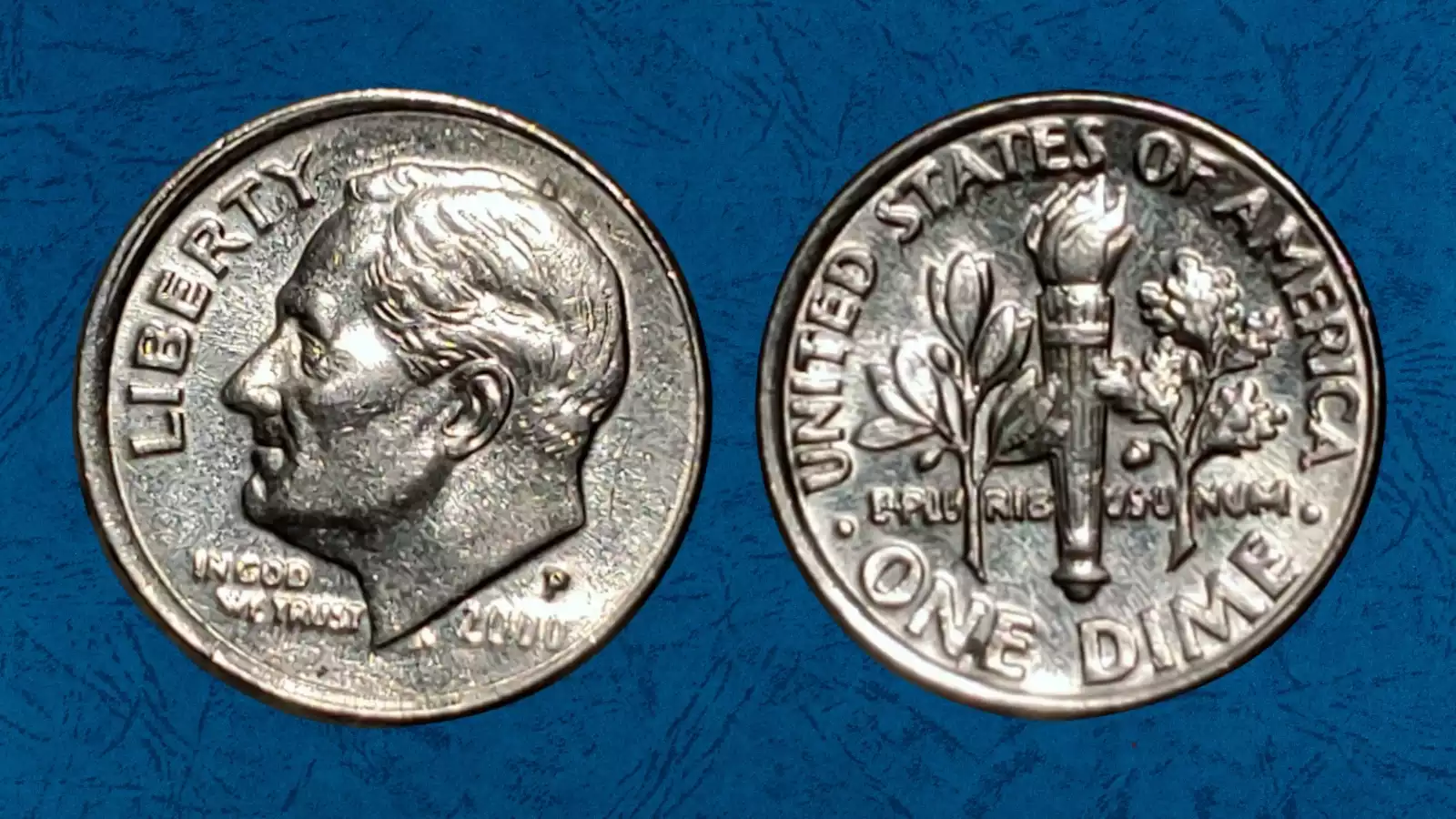 2000-P Roosevelt dime off-center strike error with design shifted and blank crescent area visible
