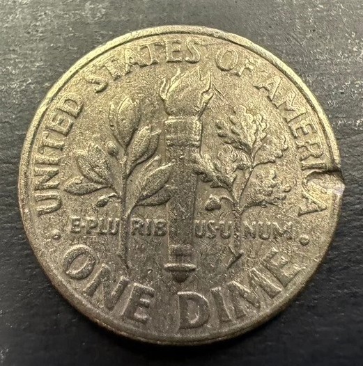2000-D Roosevelt dime rim burr error showing metal spur protruding from coin edge